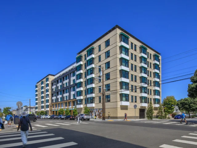 Located in the Outer Sunset District of San Francisco, 2550 Irving Affordable Housing is a 100-percent affordable, all-electric development serving families to meet a significant demand in a transit-oriented corridor of the Sunset. 

Targeting LEED Gold, the 108,000-square-foot, seven-story project provides 90 residential units, over 50% of which will be two- and three-bedroom units. The building also includes ground floor residential amenities, parking stackers, a roof patio with a playground, and potential roof areas for Urban Agriculture and PV arrays. Typical floors consist of post-tensioned concrete flat plates to maximize ceiling heights and daylighting. Each floor plate features articulated slab edges that follow the facade profile. The building is founded on a stepped mat slab supported on soil improvement through drilled displacement columns.

https://www.2550irving.com/

Architects: @pyatokarchitects 
Developer: @tndcsf
Contractor: @gcgbuilders 
Structural: Tipping (Leo Panian, Joy Wei, Fuko Tsuruta, Beverly Xu, Sijin Wang)
Photos: Sasha Moravec

#tippingstructural #affordablehousing #2550irving
